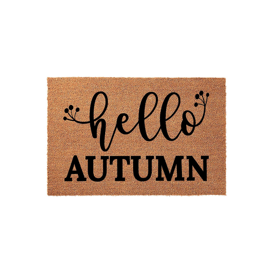 Hello Autumn coir doormat featuring natural brown coconut fiber material with black printed text and decorative floral sprigs, perfect for a seasonal front porch entryway display during the fall months to welcome guests to your