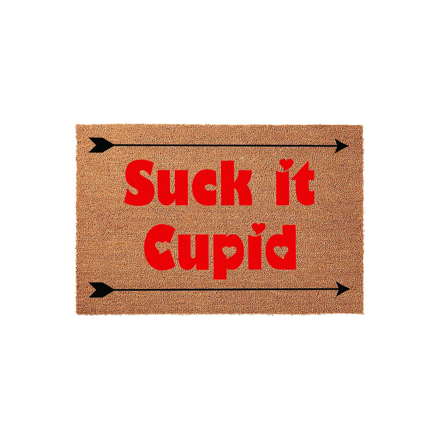 Suck it Cupid funny Valentine doormat made of natural coir fiber, featuring bold red text and black arrow graphics on a textured brown background, perfect for a humorous front porch entrance during the February holiday season.