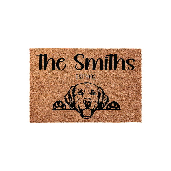 Personalized Golden Retriever family doormat featuring a natural coir texture with a black printed illustration of a dog peeking over the edge, customized with a family name and established year for a welcoming home entrance