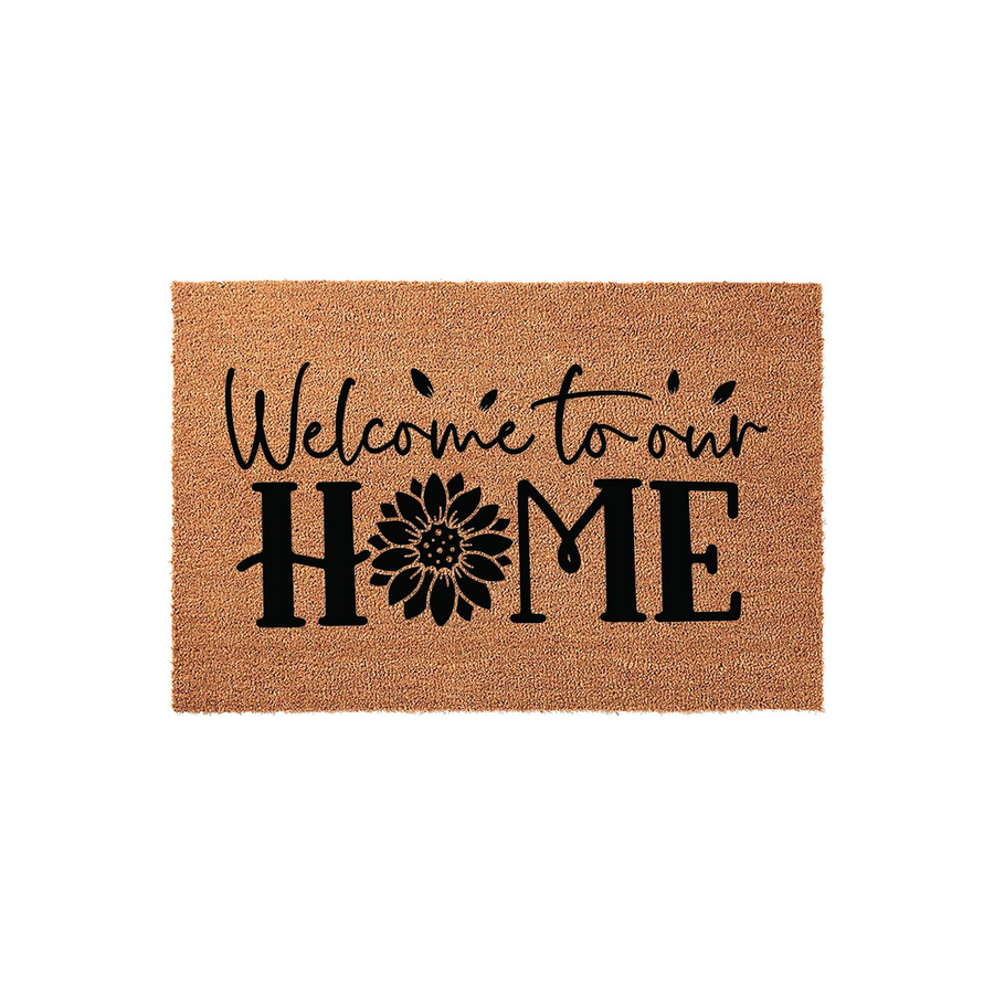 Sunflower Welcome to our Home doormat featuring a natural coir fiber texture and bold black lettering, with a detailed sunflower illustration replacing the letter O to create a charming farmhouse aesthetic for your front porch