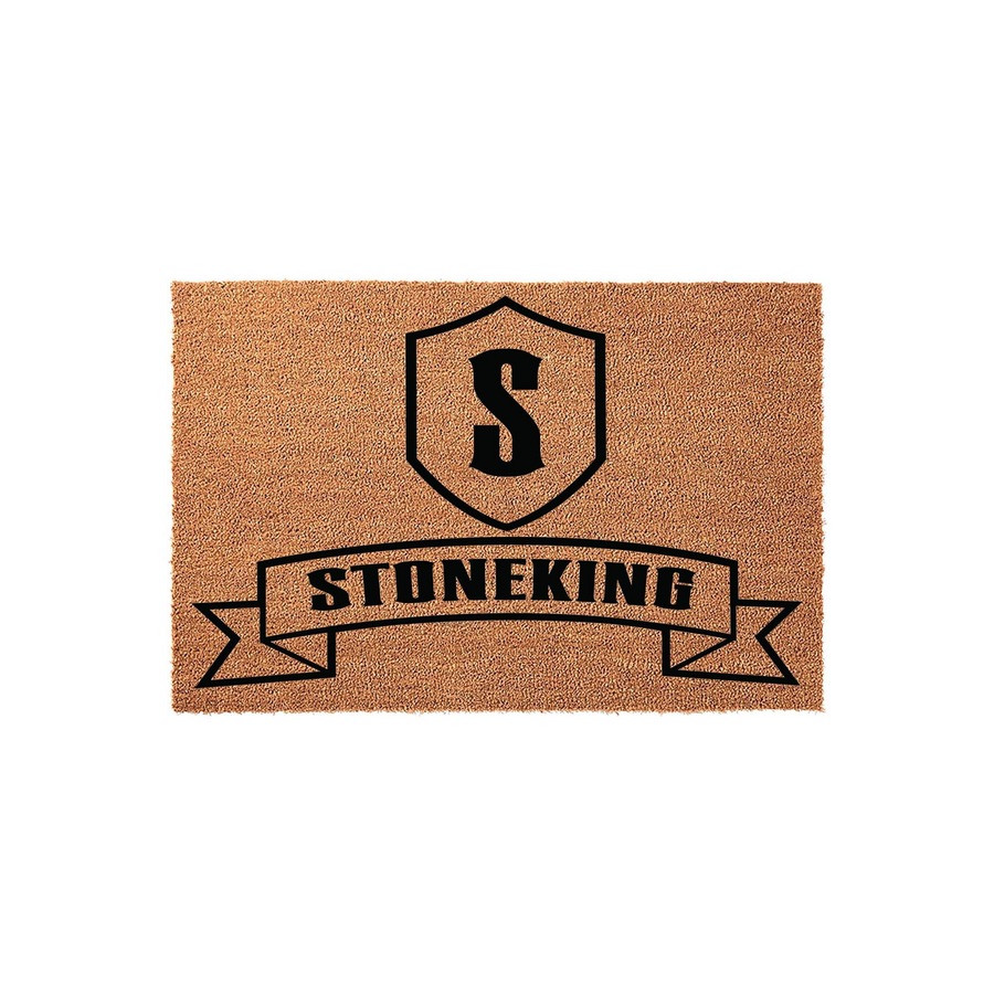 Personalized Family Name Coir Doormat featuring a bold black shield with a central letter S and a decorative banner below, providing a durable and stylish welcome mat for your front porch entrance with a classic custom design.