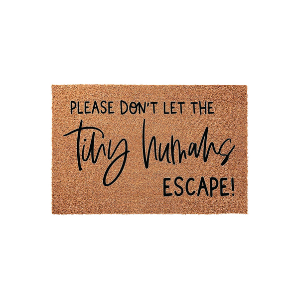Funny Tiny Humans Escape Coir Doormat featuring a natural brown coconut fiber texture with bold black text that reads Please Don't Let The Tiny Humans Escape, making it a humorous and practical front porch decor piece for any