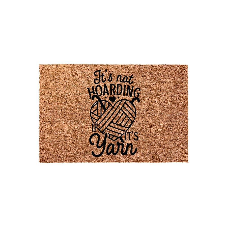 Funny Yarn Lover Doormat featuring a natural coir texture and black printed text that reads It is not hoarding if it is yarn, centered above a graphic of two yarn balls shaped into a heart for a cozy craft room or home entryway