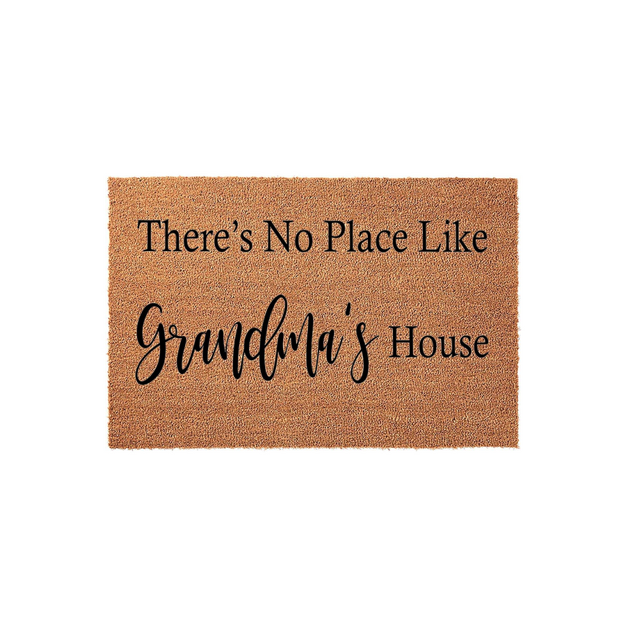 Grandma's House coir doormat featuring a natural tan fiber texture and bold black lettering that reads There's No Place Like Grandma's House, making it a welcoming front porch accessory for any home entrance on a plain white