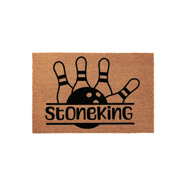 Bowling Themed Personalized Doormat featuring a black graphic of bowling pins and a ball above a custom family name, set against a natural tan coir fiber background for a durable and stylish entryway floor mat for bowling