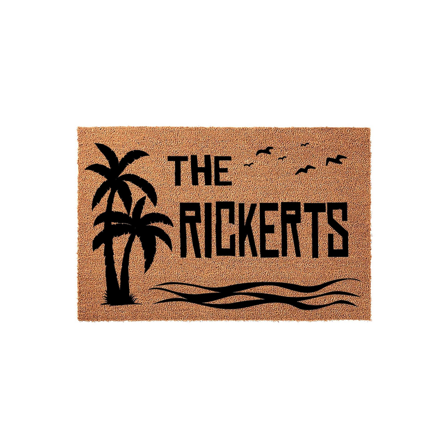 Personalized tropical palm tree doormat featuring a beach-themed design with black silhouettes of palm trees, ocean waves, and flying birds printed on a natural coir fiber mat, perfect for a coastal home entrance or beach house