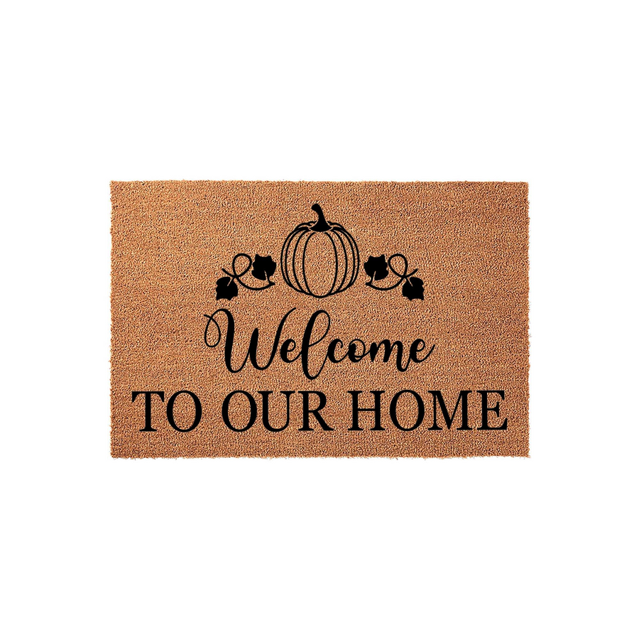 Fall Pumpkin Welcome Doormat featuring a natural coir texture with a black printed design of a pumpkin and the text Welcome To Our Home, creating a festive autumn entryway decor piece for your front porch or house entrance.