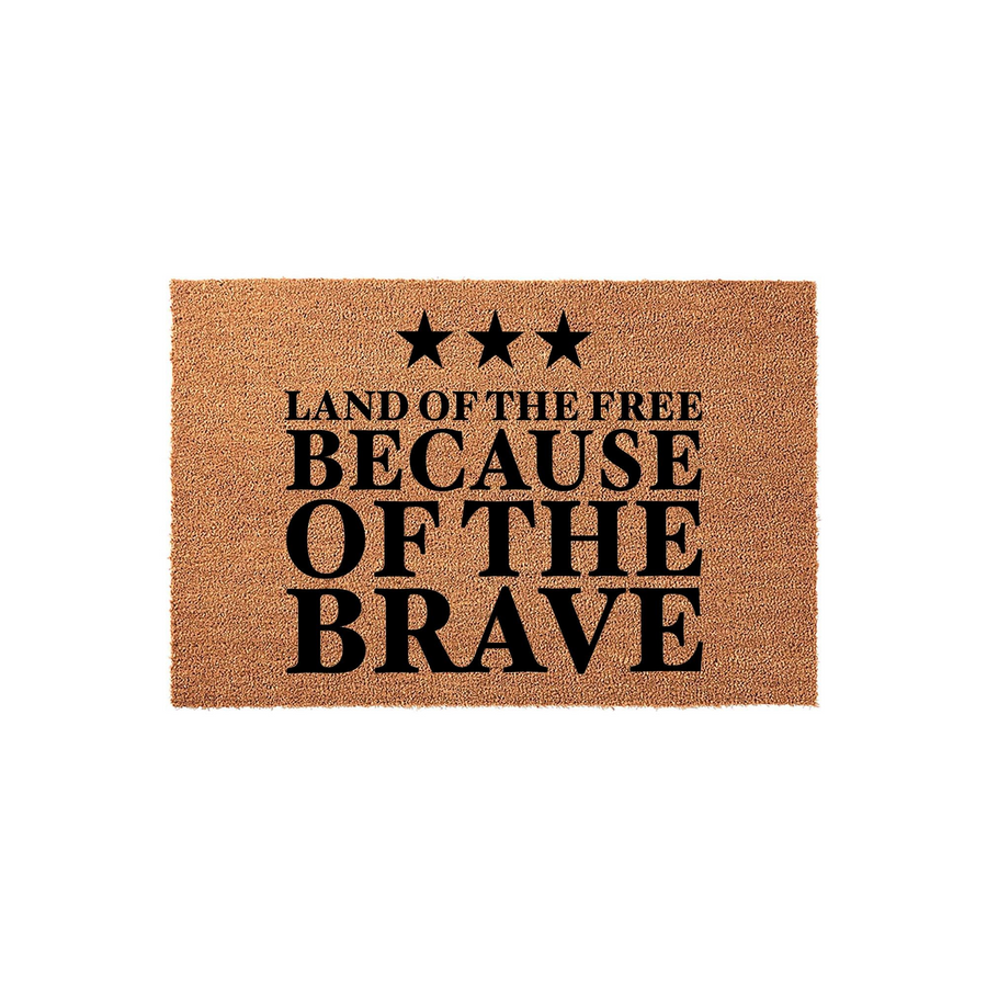 Patriotic Land of the Free Because of the Brave coir doormat featuring three black stars and bold typography on a natural brown fiber background, creating a welcoming entrance for any home celebrating American pride and military