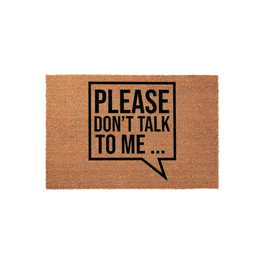 Funny Please Don't Talk To Me coir doormat featuring a bold black speech bubble graphic printed on a natural brown fiber surface, creating a humorous and welcoming entrance mat for your front porch or home entryway decor.