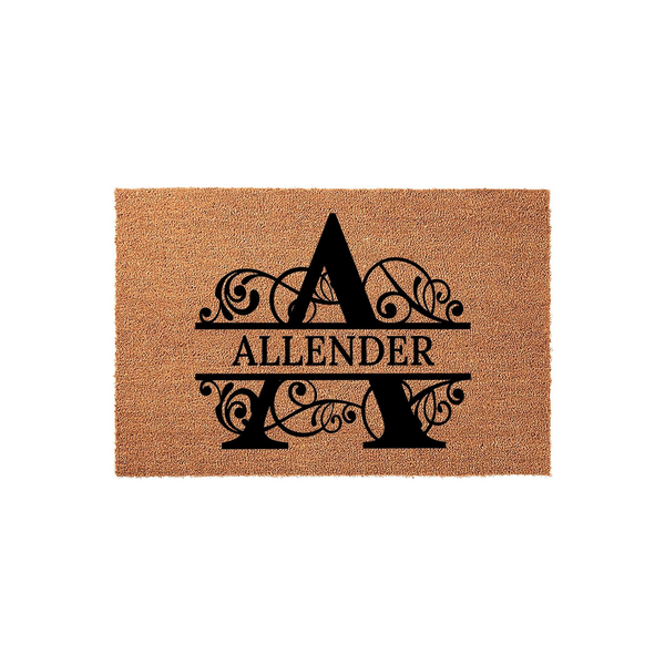 Personalized monogram coir doormat featuring a large black letter A with elegant scrollwork details and a custom family name printed in the center, creating a stylish and welcoming entrance for any home on a natural brown fiber