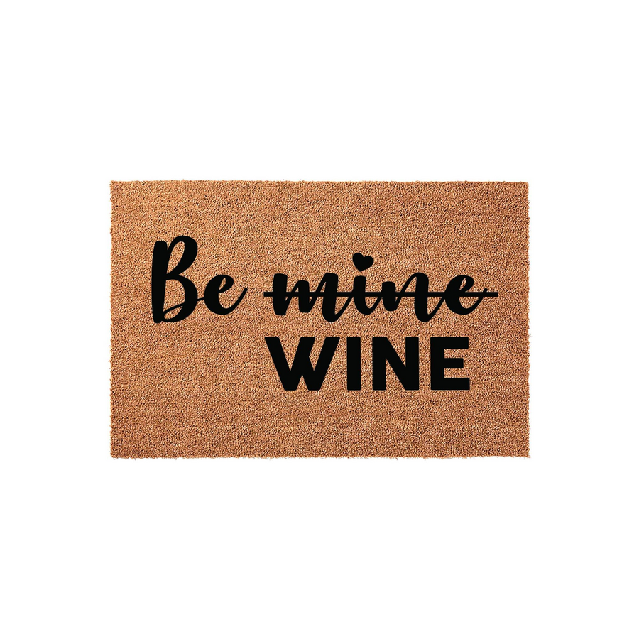 Be Mine Wine coir doormat featuring a playful pun in bold black lettering on a natural tan fiber background, perfect for adding a touch of humor to your front porch decor for Valentine's Day or any wine lover's home entrance.