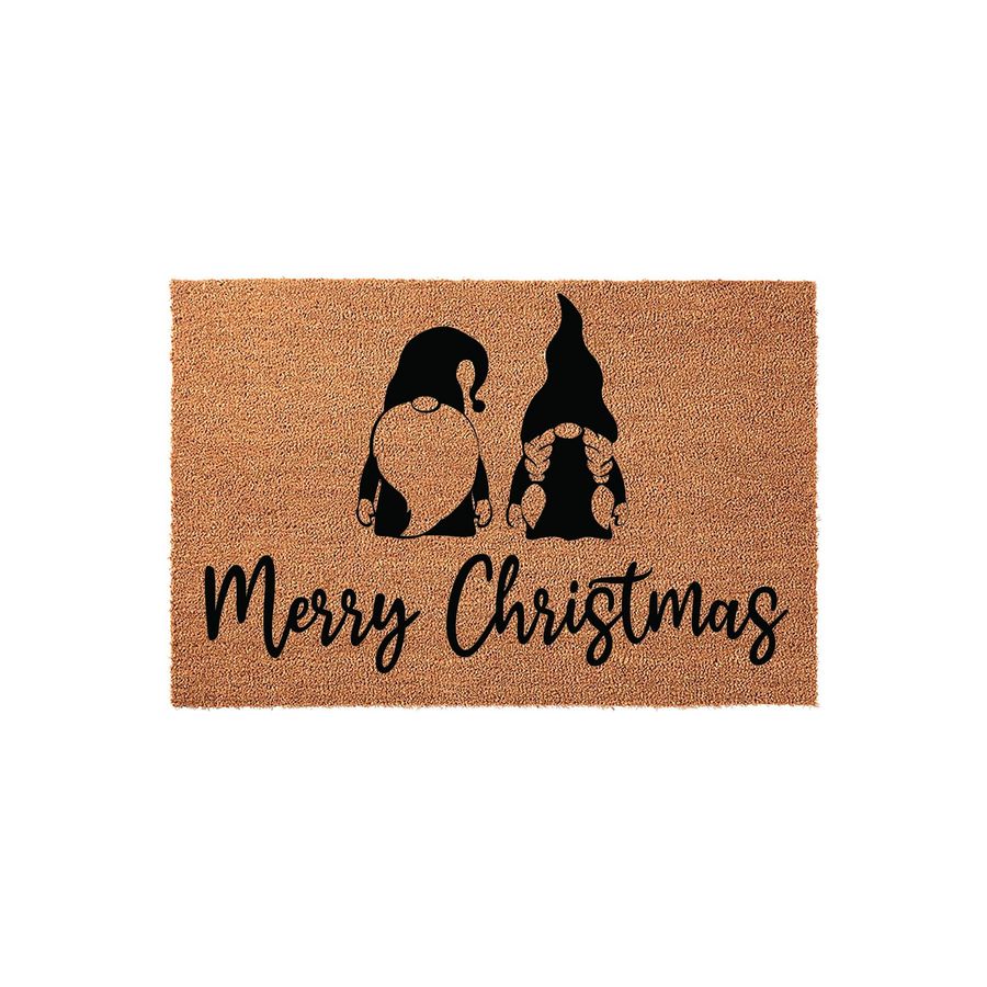 Merry Christmas gnome doormat featuring two black silhouette gnomes printed on a natural brown coir fiber mat, creating a festive holiday entryway decor piece that welcomes guests to your home during the winter season.