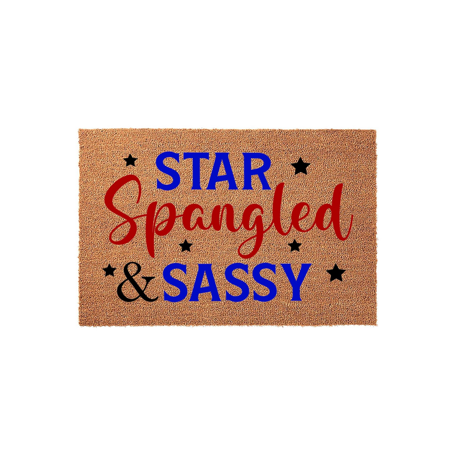 Star Spangled and Sassy coir doormat featuring patriotic red, white, and blue text with black star accents, perfect for a festive front porch entrance during the Fourth of July or any summer holiday celebration at your home.