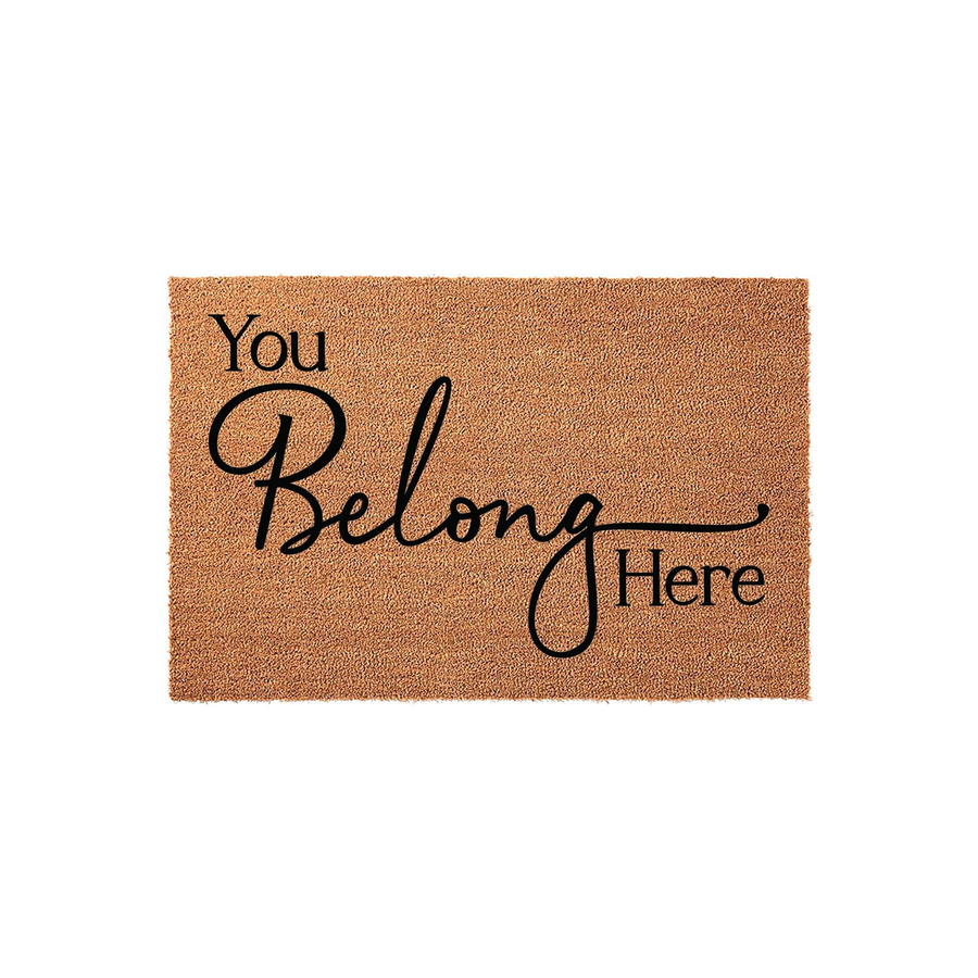 You Belong Here coir doormat featuring a natural brown fiber texture and elegant black script lettering, providing a welcoming and cozy touch to your front porch entryway decor for a warm and inviting home atmosphere.