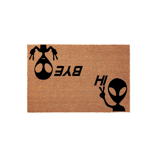 Alien Welcome Doormat featuring a natural coir texture with two black alien silhouettes, one waving with the word HI and the other upside down with the word BYE, creating a fun and quirky entrance decor piece for any sci-fi fan