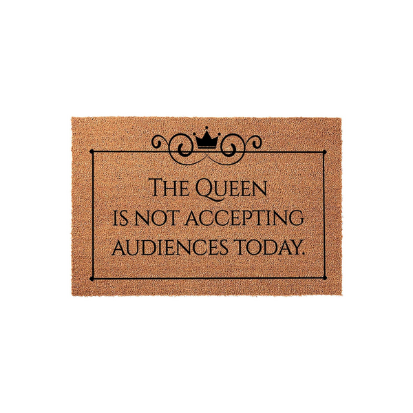 The Queen Is Not Accepting Audiences Today coir doormat features a humorous quote in black lettering with a crown icon, set against a natural brown fiber background to add a funny and welcoming touch to your front porch entryway