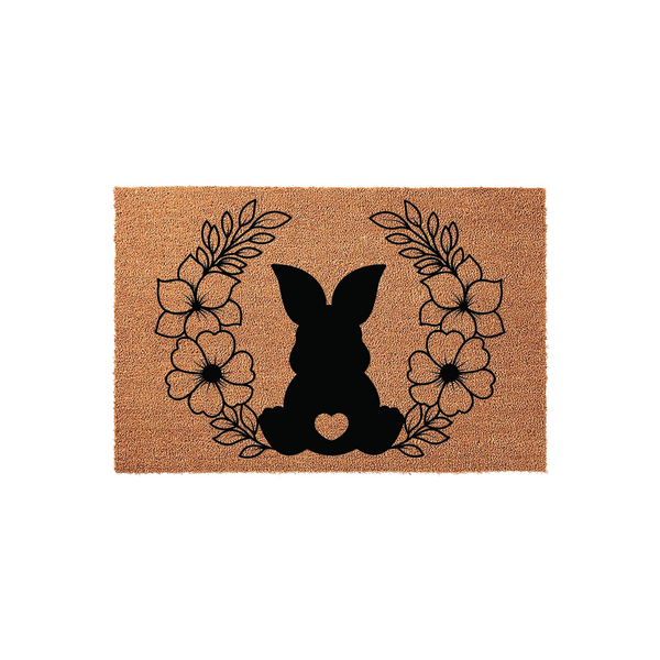 Easter Bunny Floral Coir Doormat featuring a black silhouette of a sitting rabbit with a heart cutout, surrounded by a delicate line-art wreath of flowers and leaves on a natural brown textured coconut fiber background for spring
