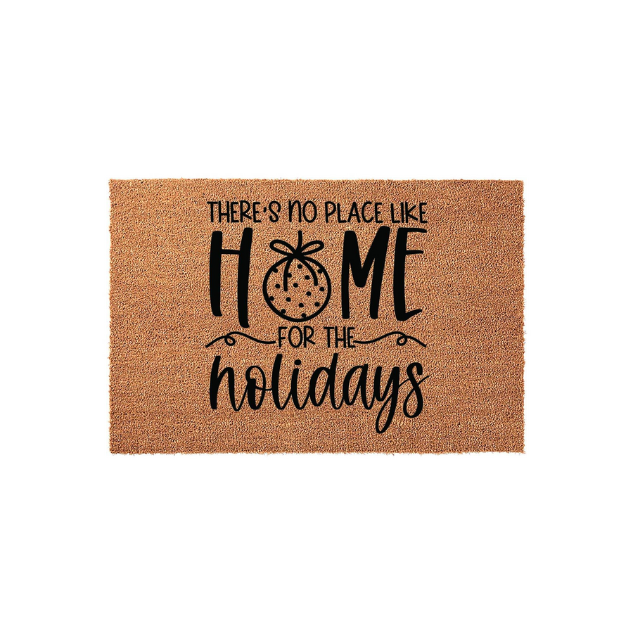 Holiday Home Doormat featuring a natural coir texture and black text that reads There is no place like home for the holidays, with a festive ornament replacing the letter O in home, set against a clean white studio background.
