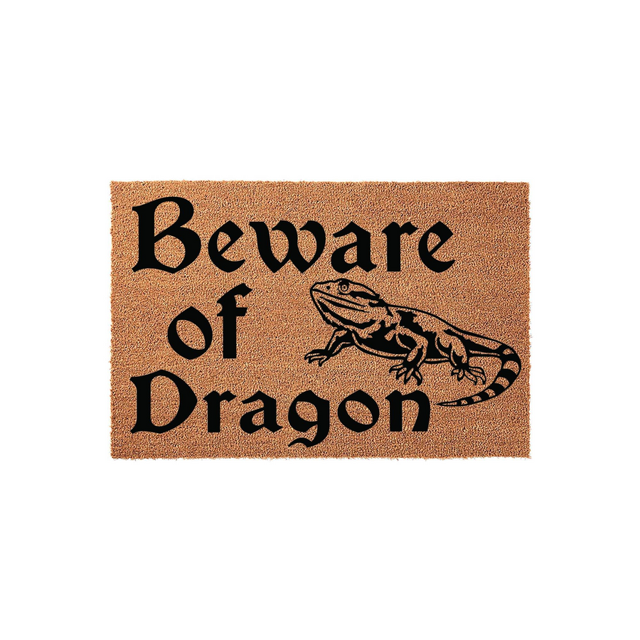 Beware of Dragon bearded dragon doormat featuring a natural coir texture and bold black text, showcasing a detailed illustration of a pet lizard that makes a fun and unique entrance decor piece for any reptile lover's home front