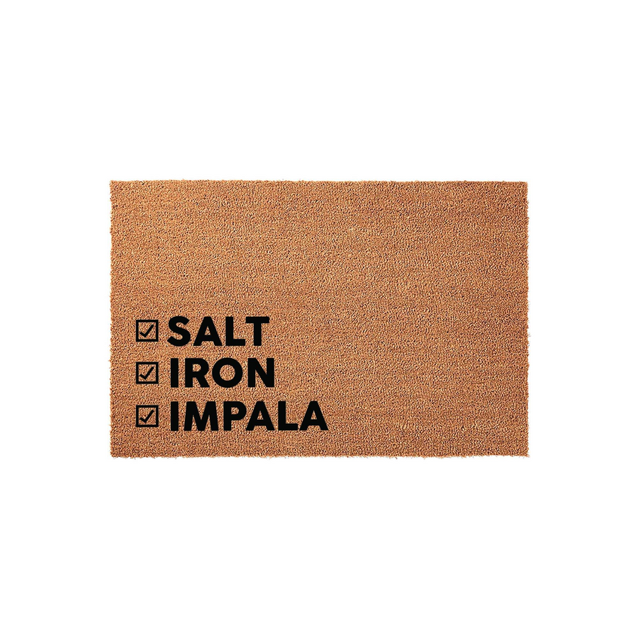 Supernatural themed coir doormat featuring a checklist design with black text that reads Salt, Iron, and Impala, set against a natural brown textured fiber background for a clean, front-door entryway aesthetic.