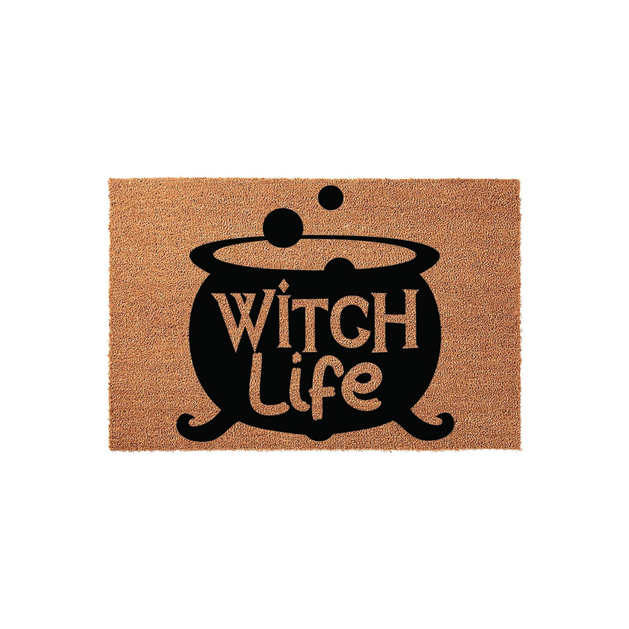 Witch Life Halloween doormat featuring a black cauldron graphic printed on a natural coir fiber mat, creating a festive and spooky entryway decor piece that is perfect for celebrating the fall season at your front door.