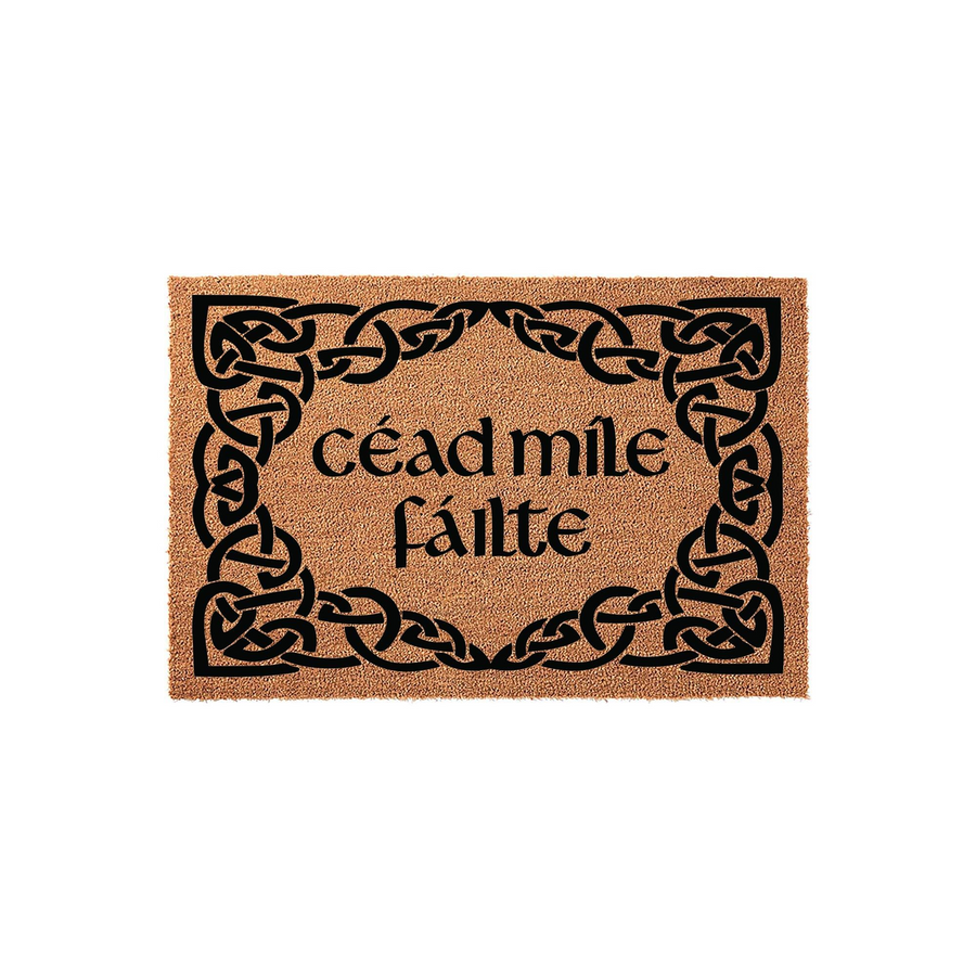 Cead Mile Failte Celtic doormat featuring a natural coir fiber texture and a bold black ink design, showcasing an intricate knotwork border surrounding the traditional Irish welcome greeting centered on the rectangular outdoor