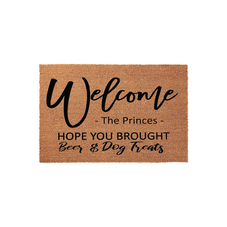 Personalized coir doormat featuring the text Welcome, The Princes, and Hope You Brought Beer and Dog Treats in a mix of script and block fonts, set against a natural tan textured fiber background for a fun front porch entryway