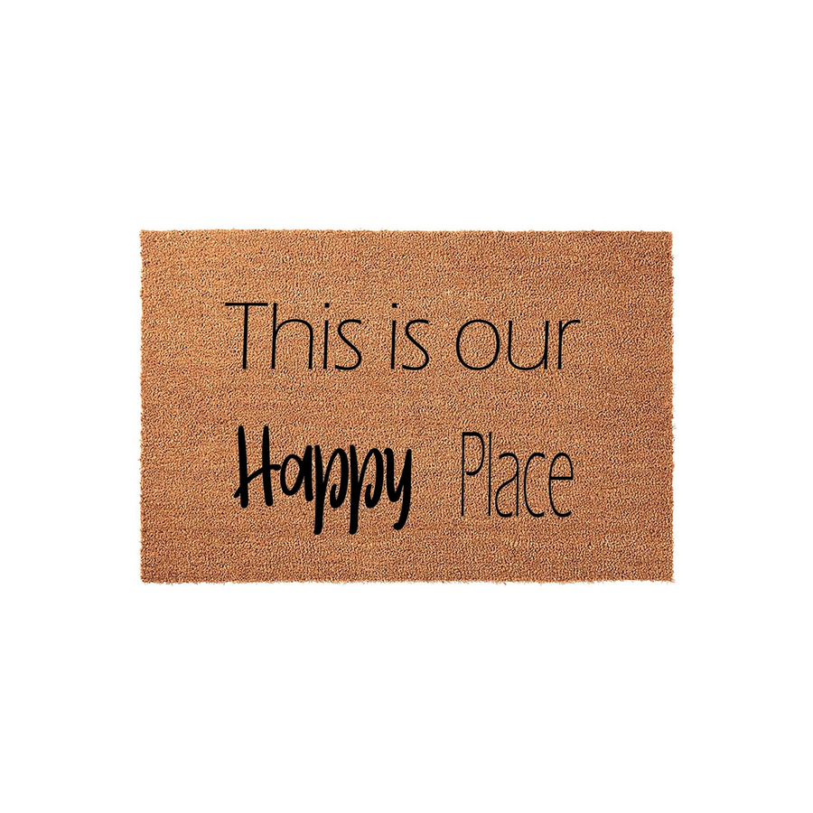 This is our Happy Place coir doormat features a natural brown fiber texture with black printed text centered on the mat, creating a welcoming and rustic aesthetic for your front porch or entryway decor in a clean studio setting.