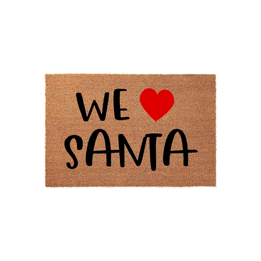 We Love Santa coir doormat featuring a natural brown fiber texture with bold black lettering and a bright red heart icon, creating a festive holiday entryway decoration for your front porch during the Christmas season.