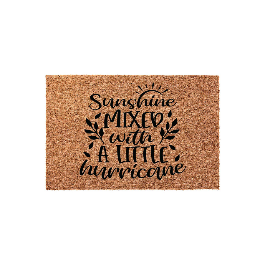 Sunshine Mixed with a Little Hurricane Coir Doormat featuring bold black typography and decorative leaf accents on a natural brown fiber background, creating a fun and welcoming entrance for your front porch or home entryway.