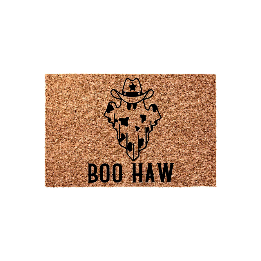 Boo Haw Halloween doormat featuring a cute ghost wearing a cowboy hat with a cow print pattern, printed in black on a natural brown coir fiber mat, perfect for adding a fun western touch to your front porch decor this spooky