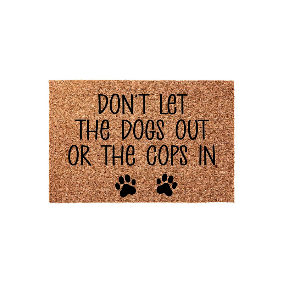 Funny Dog Lover Doormat made of natural coir fiber, featuring the humorous text Don't Let The Dogs Out Or The Cops In printed in black ink above two small paw prints on a plain white background for a clean, modern entryway look.