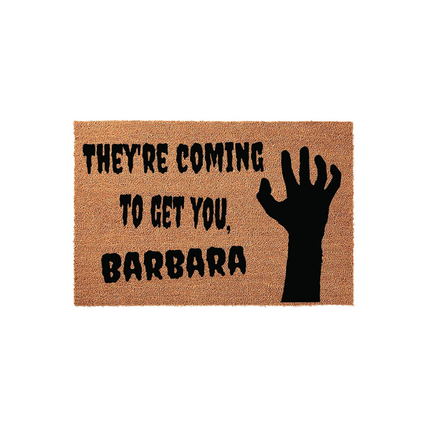 Horror movie themed doormat featuring a natural coir texture with a black silhouette of a zombie hand and the iconic quote They are coming to get you, Barbara printed in bold, distressed lettering for a spooky front porch