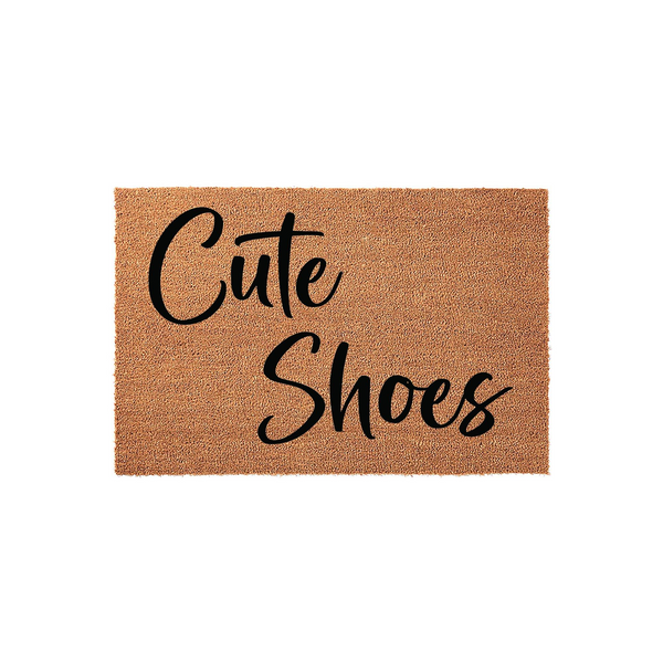 Cute Shoes coir doormat featuring a natural tan fiber texture and bold black cursive lettering, providing a fun and welcoming entrance decor piece for your front porch or entryway that highlights your love for stylish footwear.