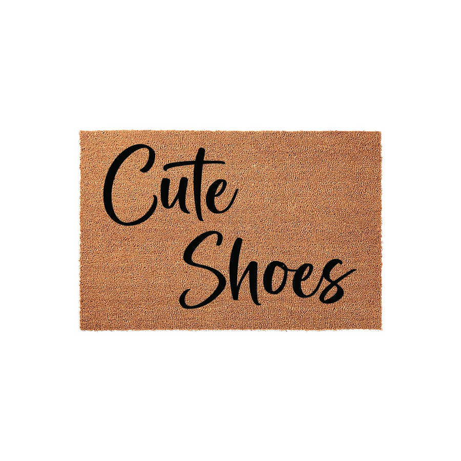 Cute Shoes coir doormat featuring a natural tan fiber texture and bold black cursive lettering, providing a fun and welcoming entrance decor piece for your front porch or entryway that highlights your love for stylish footwear.