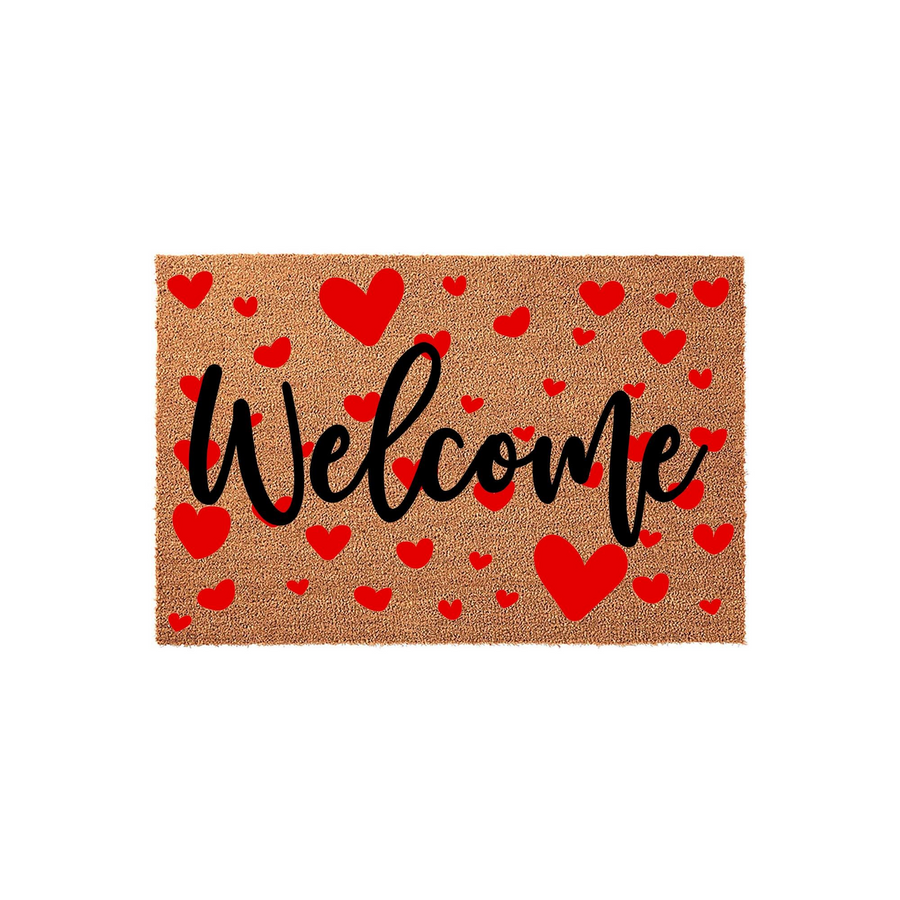 Heart Welcome Doormat featuring a natural coir texture background decorated with numerous bright red hearts and the word Welcome written in a bold black cursive script, creating a festive and inviting entryway floor mat design.
