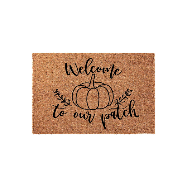 Welcome to our patch fall doormat made of natural coir fiber, featuring a black printed pumpkin illustration with leafy vines and elegant script lettering centered on a rectangular tan background for seasonal autumn home decor.