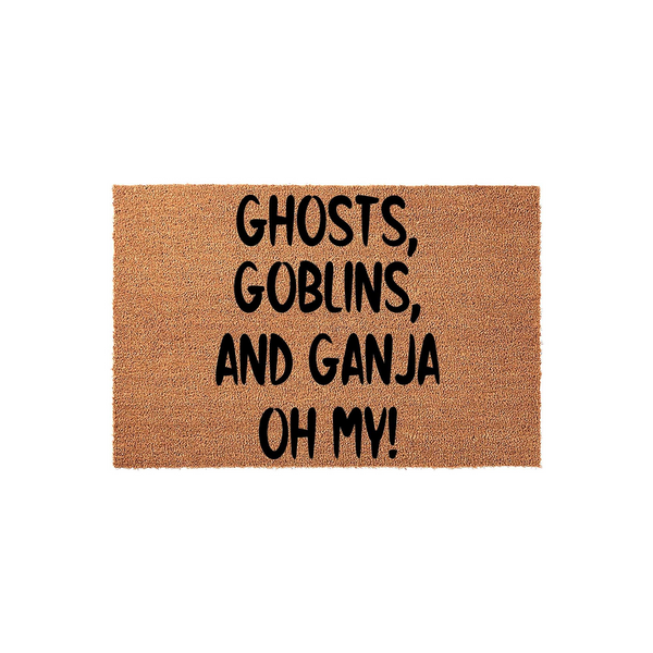Funny Halloween doormat made of natural coir fiber featuring the bold black text Ghosts, Goblins, and Ganja Oh My, providing a humorous and festive seasonal welcome for your front porch entryway during the spooky autumn holiday