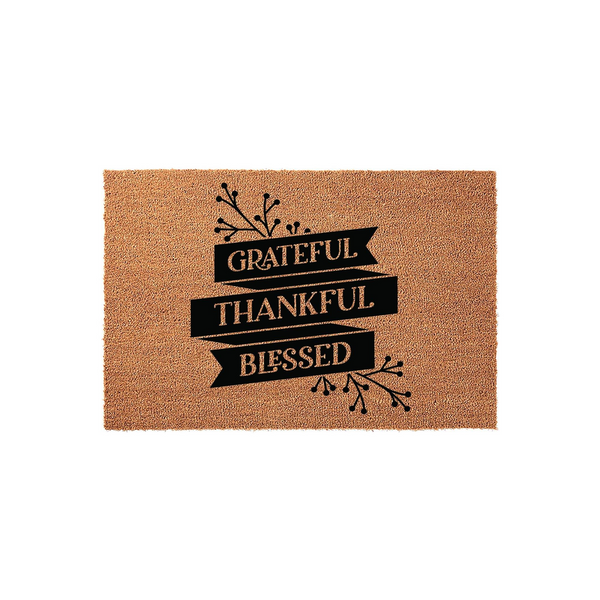 Grateful Thankful Blessed coir doormat featuring a natural brown fiber texture with black printed banners and decorative branch accents, creating a welcoming farmhouse style entrance piece for your home front porch or entryway