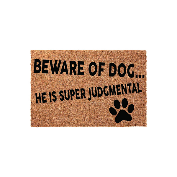 Funny Beware of Dog Doormat featuring a natural coir texture with bold black text that reads Beware of Dog... He Is Super Judgmental, accented by a single black paw print graphic on a clean white background for a modern entryway