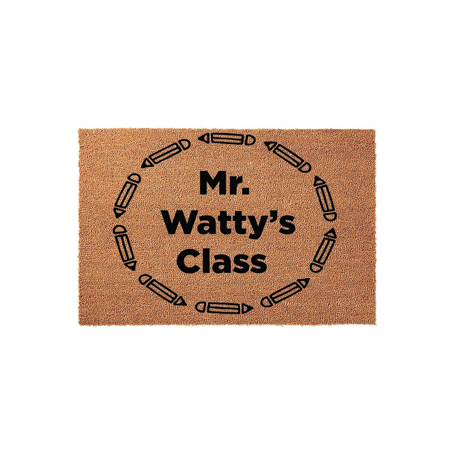 Personalized Teacher Classroom Doormat featuring a natural coir texture with a black printed design of pencils arranged in a circle around the custom text, creating a welcoming entrance for a school classroom or teacher office