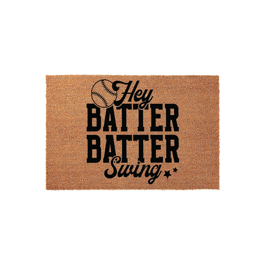 Hey Batter Batter Swing Baseball Doormat made of natural coir fiber, featuring bold black typography and a baseball graphic on a rectangular tan mat, perfect for a sports-themed front porch entrance for any baseball fan home.