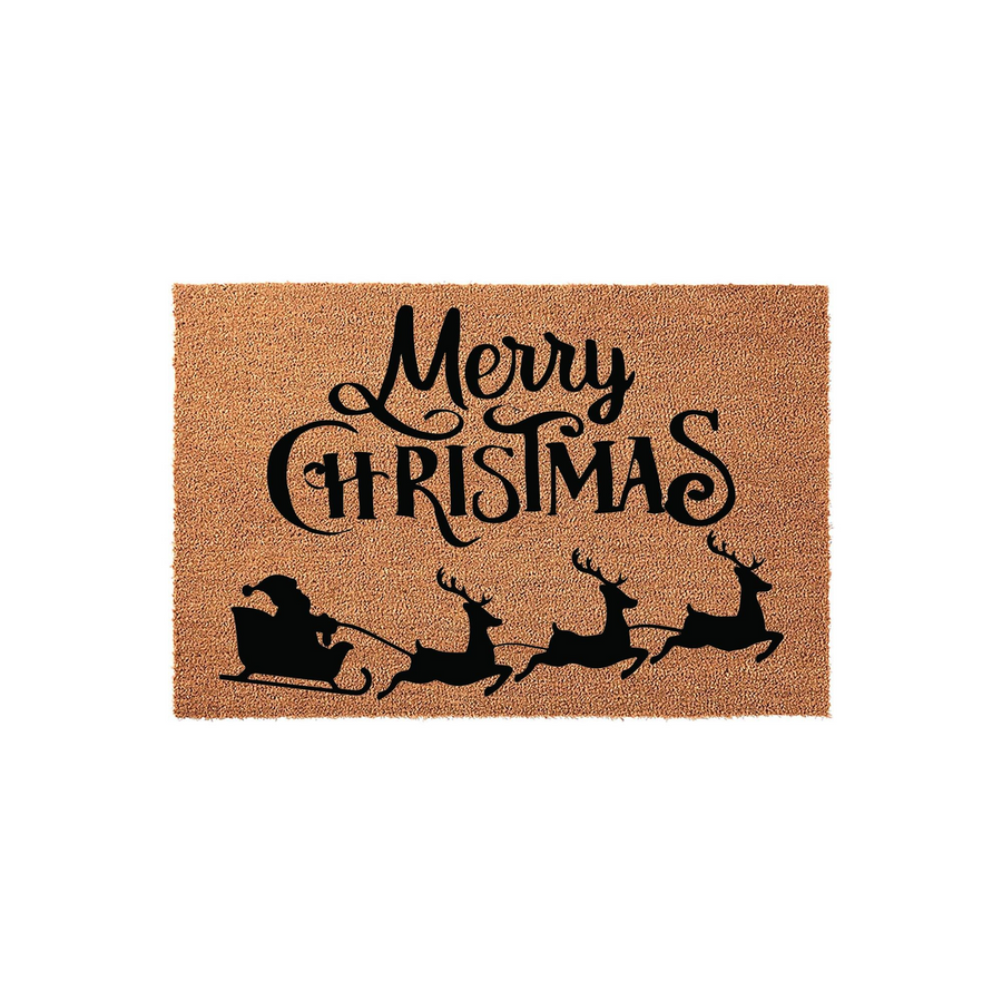 Merry Christmas coir doormat featuring a black silhouette of Santa Claus in his sleigh pulled by three flying reindeer, set against a natural brown textured fiber background for a festive holiday entryway decoration.