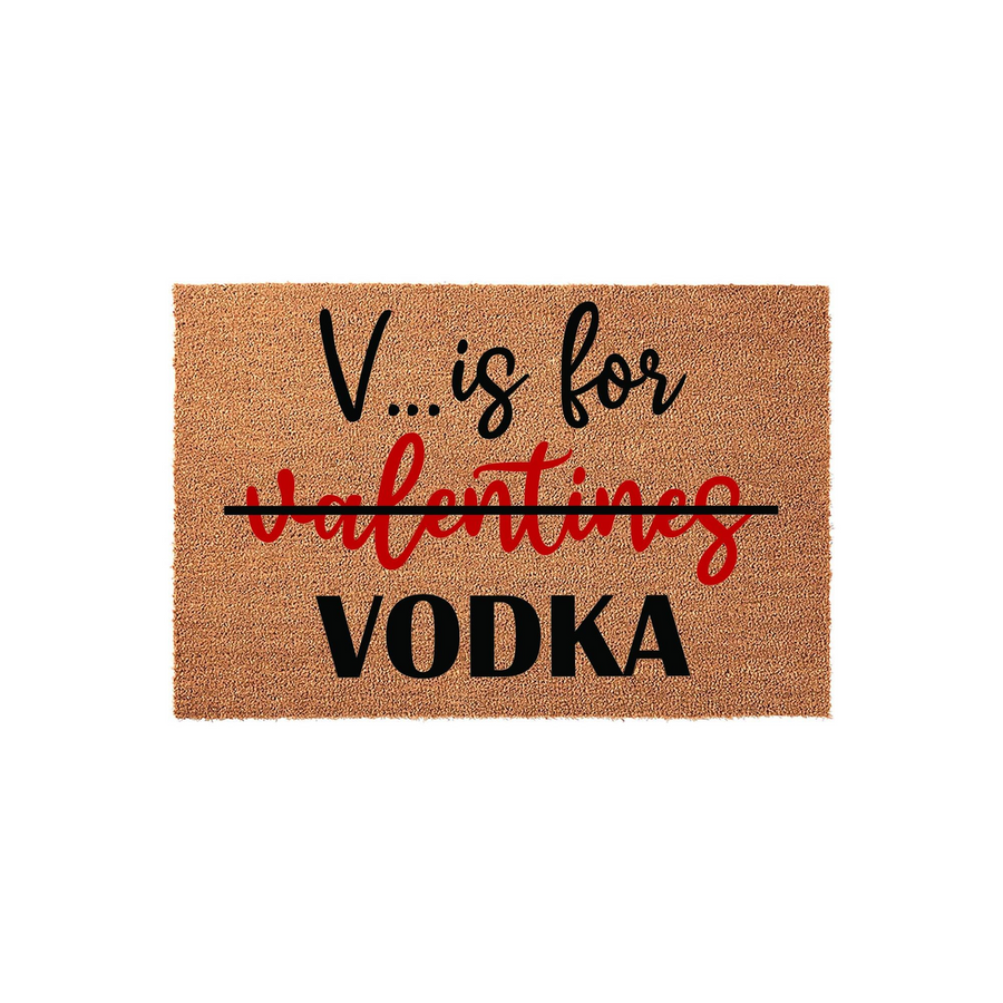 Funny Valentine's Day doormat made of natural coir fiber, featuring the text V is for valentines with a black line through it and the word VODKA printed in bold black letters below, set against a clean white studio background.