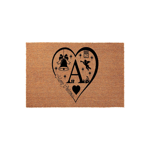 Personalized Christmas doormat featuring a large black heart design with a central initial, a festive bell, a small angel, and the words Merry Christmas printed on a natural brown coir fiber mat against a clean white studio