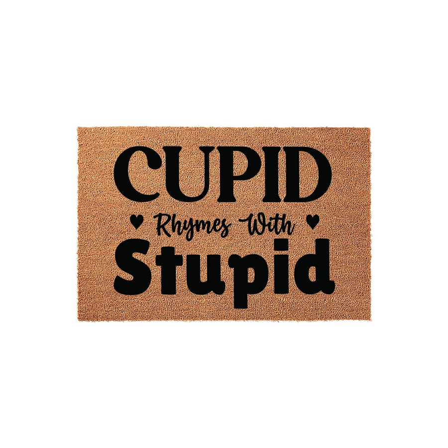 Funny Valentine's Day coir doormat featuring the text Cupid Rhymes With Stupid in bold black lettering, set against a natural brown fiber background to add a humorous touch to your front porch decor for the holiday season.