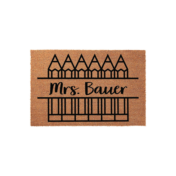 Personalized Teacher Classroom Doormat featuring a natural coir texture with a black graphic of pencils and a custom name line, creating a welcoming entrance for any school classroom or teacher office door on a clean white