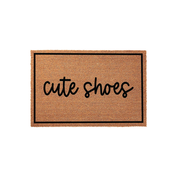 Cute Shoes Coir Doormat featuring a natural tan fiber texture with a bold black border and the phrase cute shoes written in a playful black script font, centered on a clean white background for a modern entryway decor look.