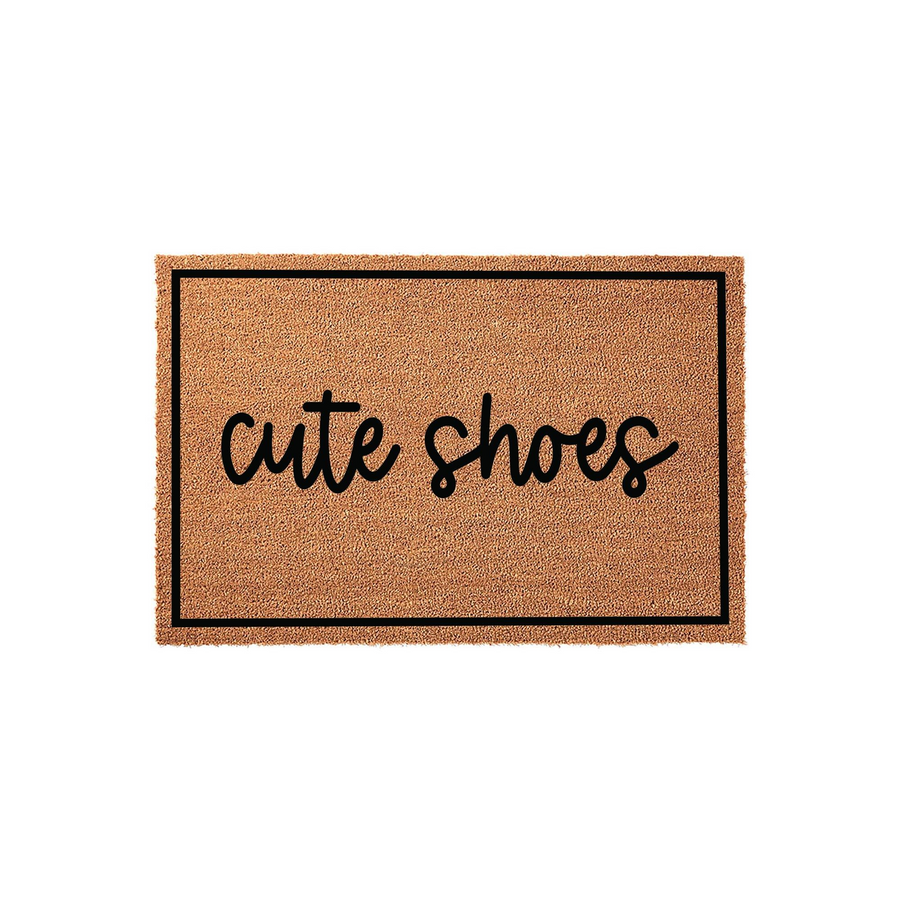 Cute Shoes Coir Doormat featuring a natural tan fiber texture with a bold black border and the phrase cute shoes written in a playful black script font, centered on a clean white background for a modern entryway decor look.
