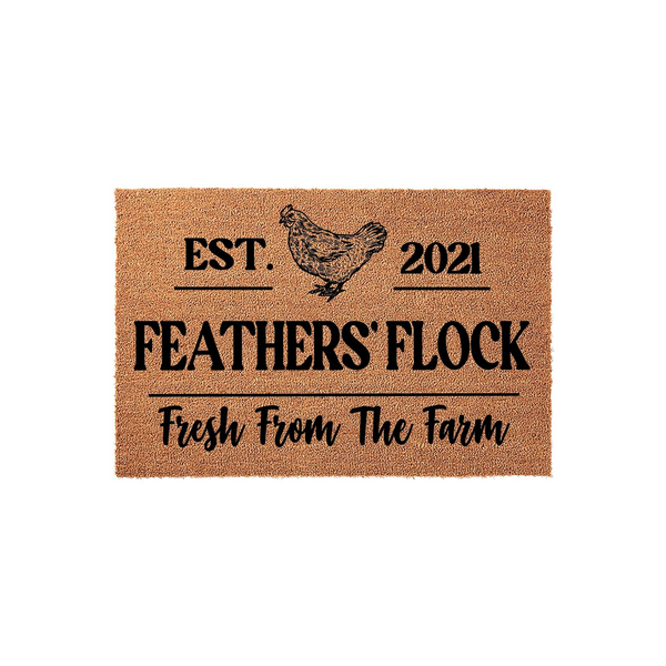 Farmhouse Chicken Coir Doormat featuring a rustic illustration of a hen, the text EST. 2021, and the phrase Feathers' Flock Fresh From The Farm printed in bold black lettering on a natural brown textured fiber background.